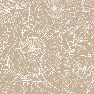 Белая паутина на бежевом фоне