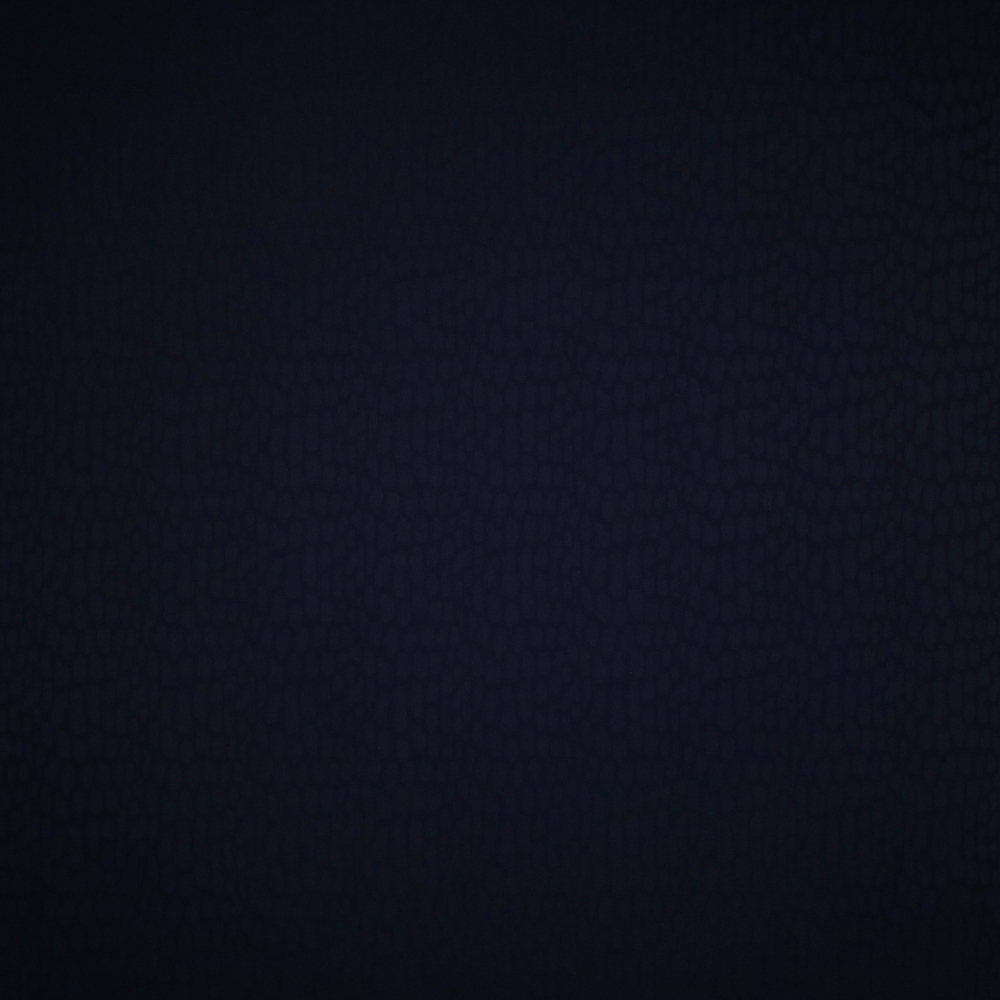 Костюмная ткань из шерсти с эластаном с леопардовыми пятнами в тёмно-синем цвете