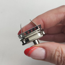 Замок вертушка на винтах 27*17 Серебро