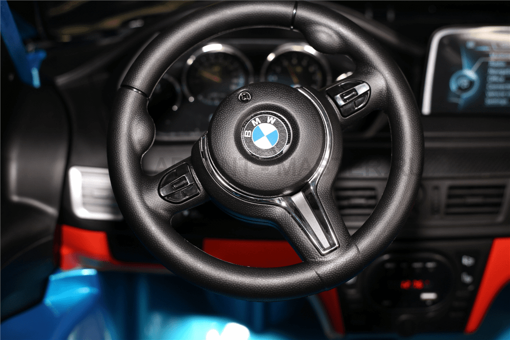 Детский двухместный электромобиль "BMW X6M" JJ2199 12V