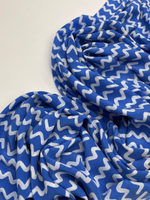 Шелк голубой с белыми узорами