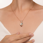 Подвеска «Перед грозой» из красного золота с перламутром