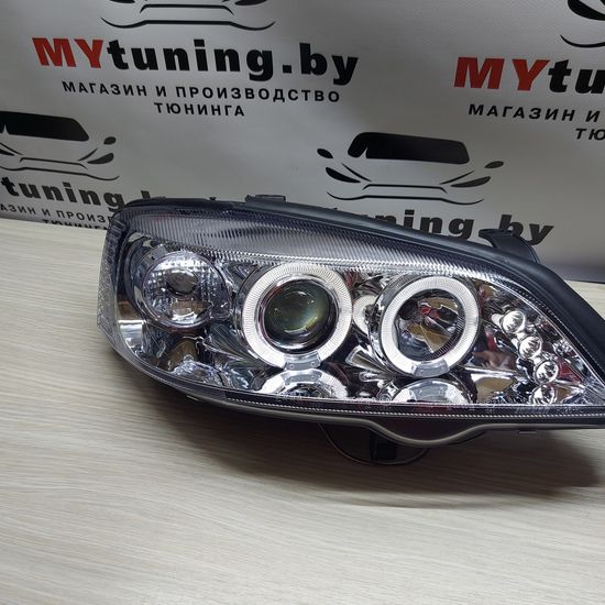 Передние фары Opel Astra G angel eyes chrome
