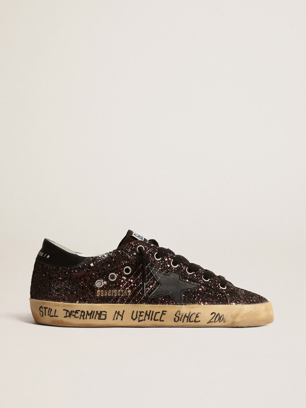 Super-Star in black glitter with black leather star and heel tab