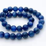 Бусины Кианит (тонирован), диаметр 6,6-6,8 мм, цена за 15 шт (1/4 нити)