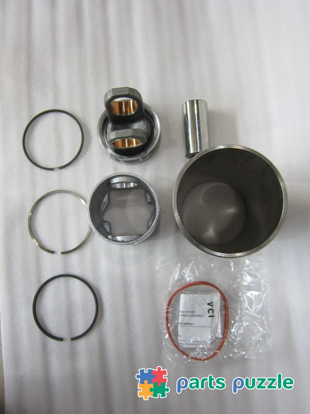 Поршень в сборе с кольцами и гильзой / KIT,PISTON/LINE АРТ: 10000-50041