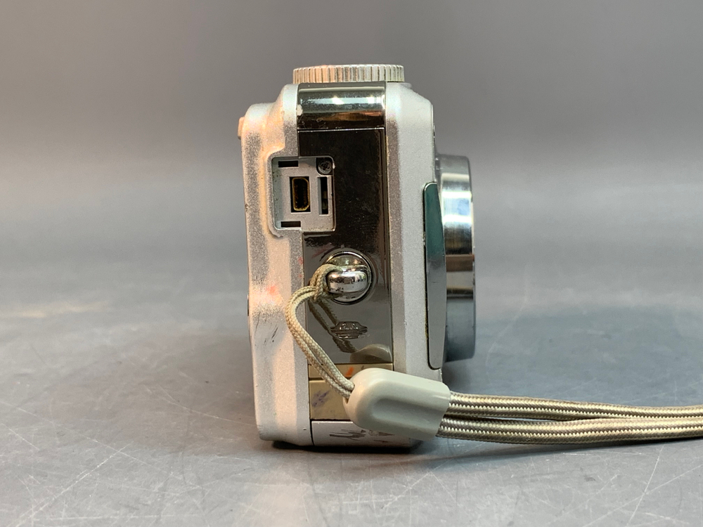 Sony DSC-S800, внутри объектива налет