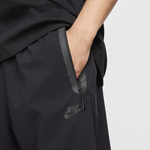 HM7158-010 Брюки M NK TCH WVN PANT OS