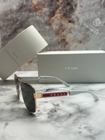 Солнечные очки Prada