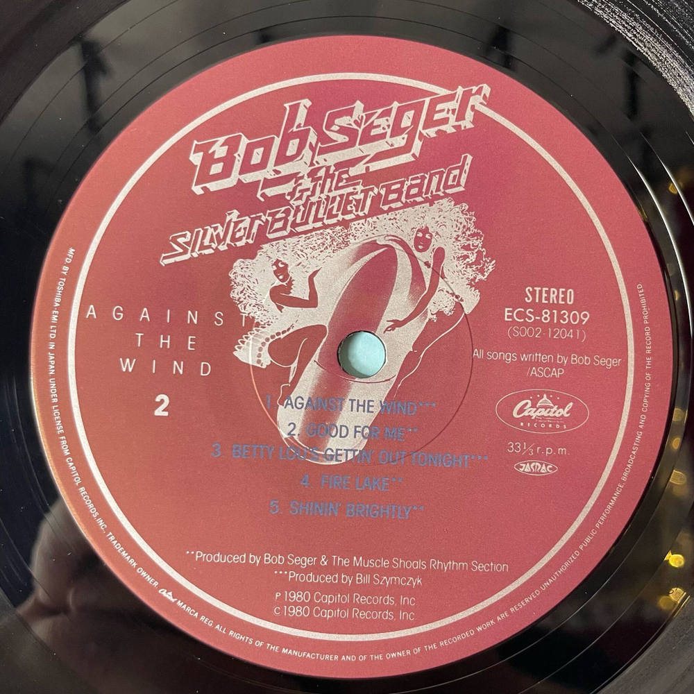 Винтажная виниловая пластинка LP Bob Seger and The Silver Bullet Band Against The Wind (Japan 1980) (Obi)