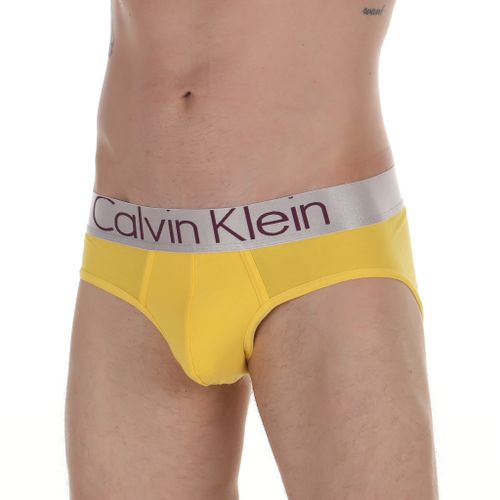 Мужские трусы брифы желтые Calvin Klein