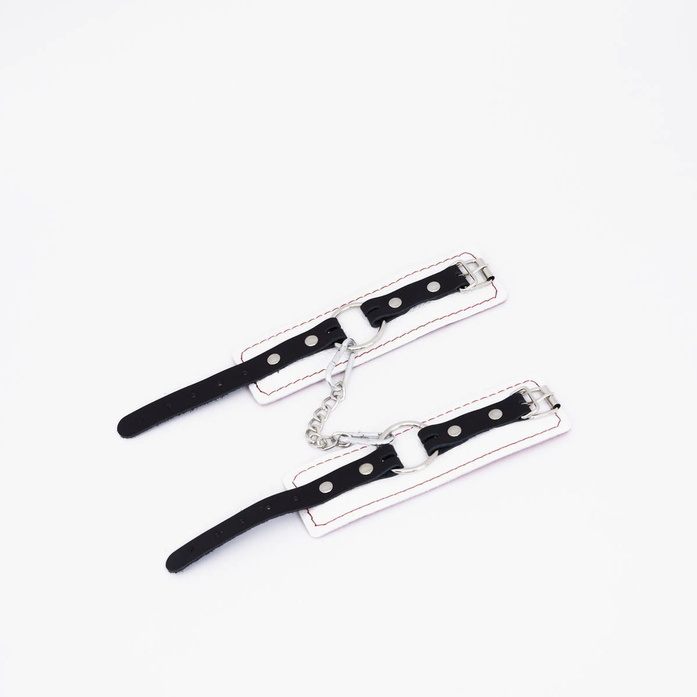 Бело-красные кожаные наручники