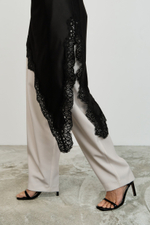 Топ асимметричный