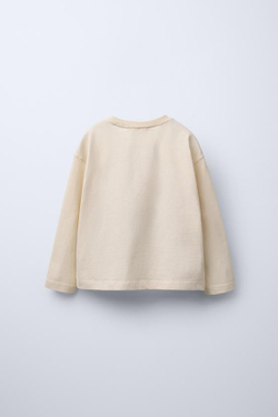 ZARA ЛОНГСЛИВ С ПРИНТОМ © DISNEY, ЦВЕТ СЛИВОЧНОГО МАСЛА