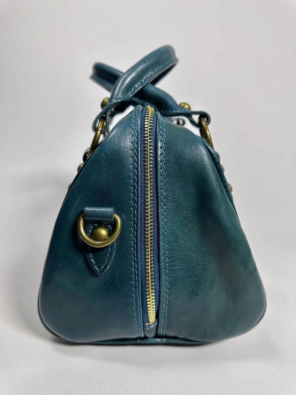 Женская сумка-саквояж из натуральной кожи цвета морской волны