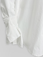 Рубашка однотонная удлиненная сзади и с рукавами расклешенными к низу