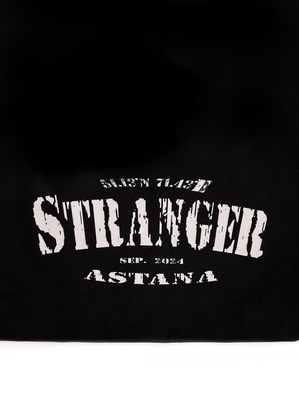 Shopper with "Stranger" logo