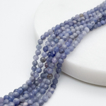 Танзанит граненый бусины, диаметр 3,1-3,3 мм, цена за отрезок 19 см (1/2 нити)