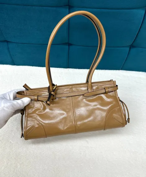 Кожаная средняя сумка Prada Bonnie, коричневый