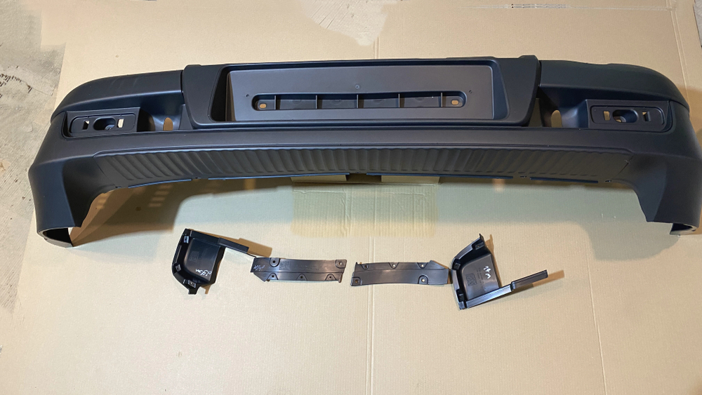 Бампер задний Нива Шевроле Бертоне 03.2009 - 2020 (оригинал)