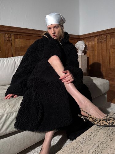 Длинная двусторонняя шуба из овчины