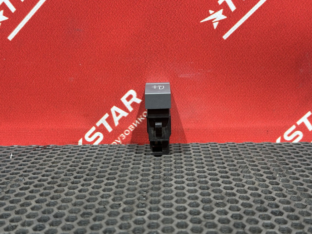 Кнопка выравнивания шасси