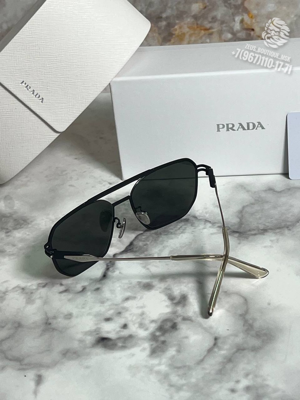 Солнечные очки Prada