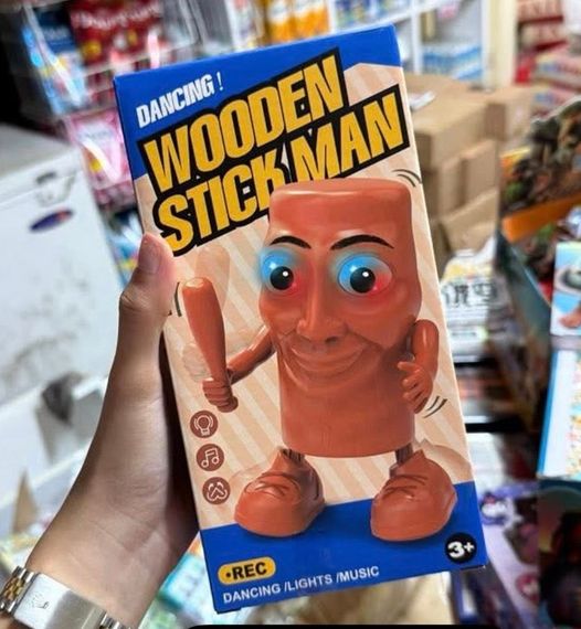 Wooden stick man toy dancing