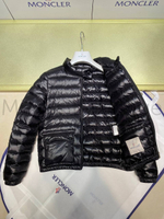The brand's designers have made the women's quilted black Moncler Lans premium jacket light and at the same time as comfortable as possible for the weather.