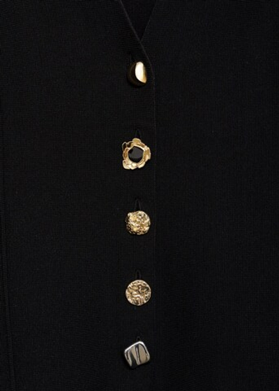 Вязаный жакет с нарядными пуговицами