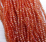 БП043ДС23 Хрустальные бусины "рондель", цвет: коралловый AB прозр., 2х3 мм, кол-во: 95-100 шт.
