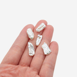 Жемчуг культивированный Бива, белый, со смещенным боковым отверстием 12-22мм