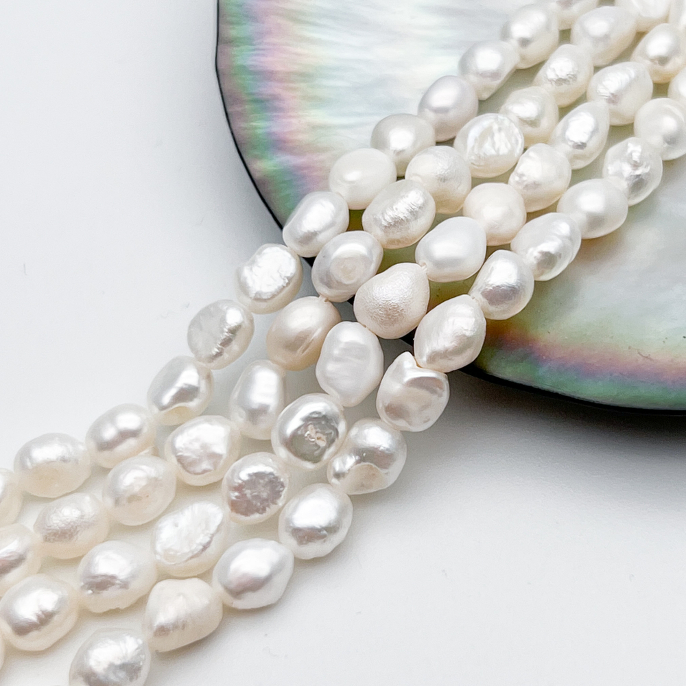 Жемчуг, размер около 6,5-7*5,7-6 мм, цена за нить 38 см