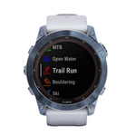 Спортивные часы Garmin fenix 7X Sapphire Solar Edition, 51 мм, силиконовый ремешок цвета «Уайтстоун» Безель из титана цвета «синий минерал» с DLC-покрытием, дисплей Solar со стеклом Power Sapphire. Ремешок с классической застёжкой — на запястье обхватом 1