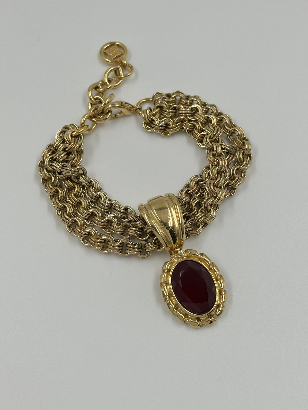 Браслет с подвеской с бордовым кристаллом Givenchy