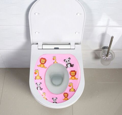 Розовое детское сиденье для унитаза «Зверята»