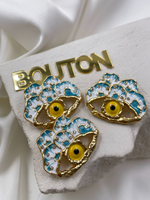 Пуговицы со стразами Скиап. золотистые в форме глаза с белой и бирюзовой эмалью