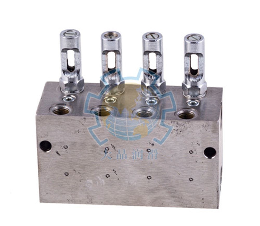 KW-42 - Питатель для двухлинейных систем смазки с рабочим давлением 200 бар, количество выходов 2, максимальная доза 2,5 мл/цикл, с регулятором и индикатором