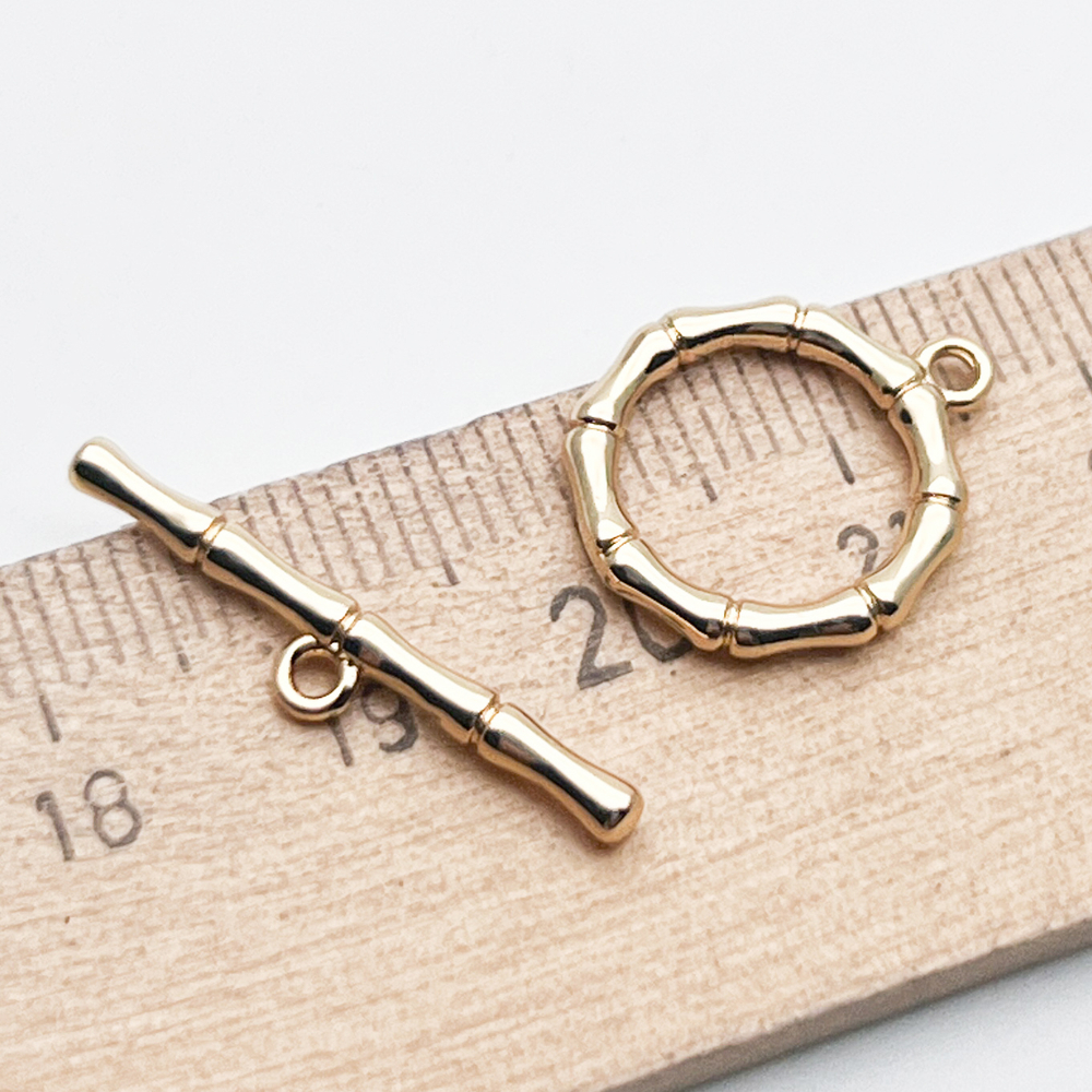 Замок-тоггл, цвет золото, размер 17*15 мм, палочка 24*4,5 мм, цена за 1 шт