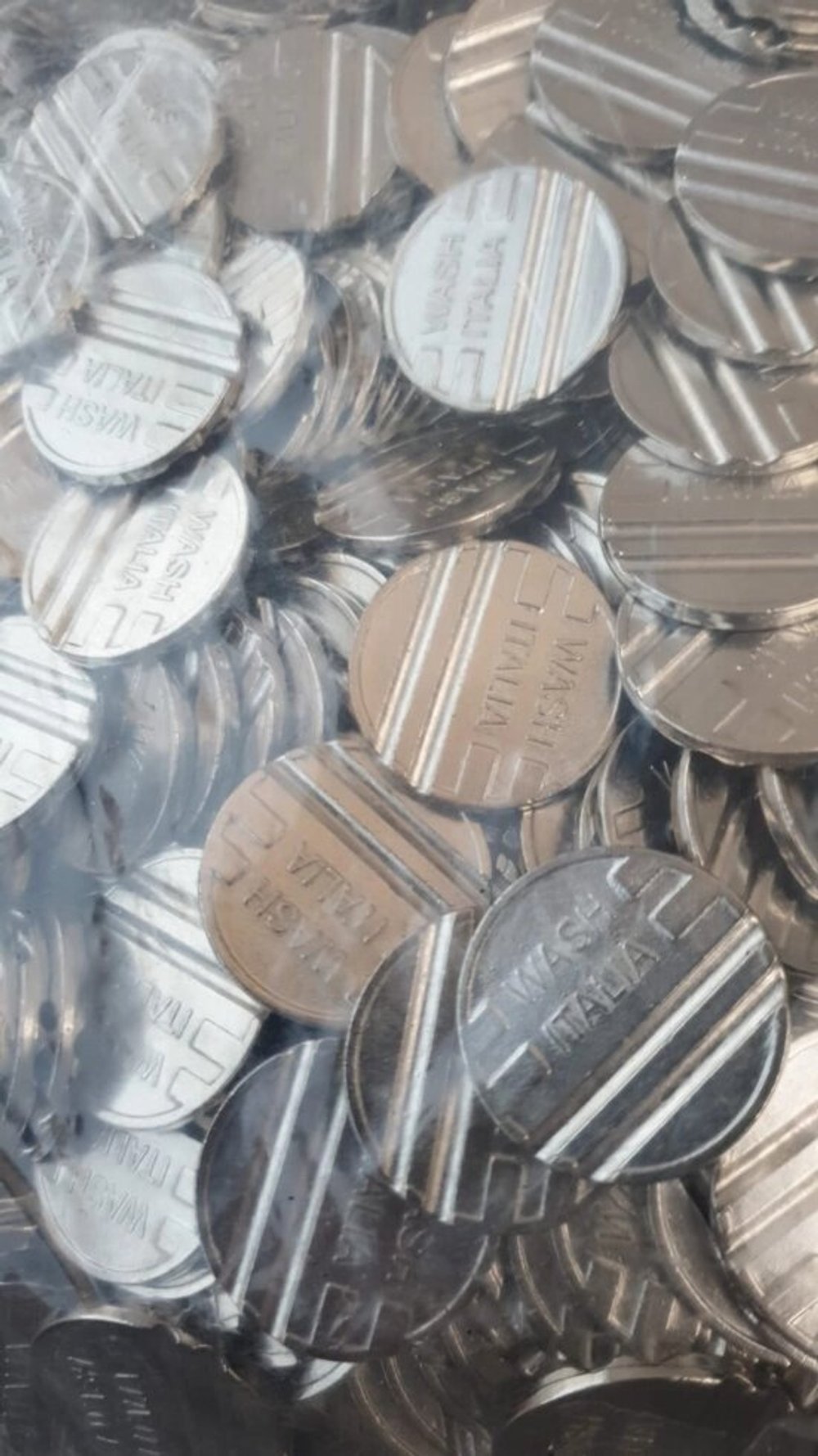 Жетоны с прорезью для автомоек 25мм\2мм