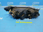 Фара передняя левая MAZDA FAMILIA 2000-2003