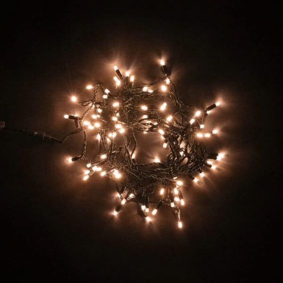 Светодиодная гирлянда с колпачком 100 экстра теплых белых LED ламп 10 м., 24В., черный провод ПВХ, IP65, LTC (PST100CAP-11-1EWW)