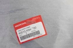 40510-K94-T00. CASE, DRIVE CHAIN. Honda CB125, CB150R, CBF125N, CBF150N
