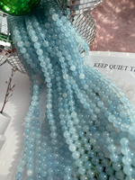 Нить бусин из тонированного кварца 8мм, гладкие