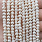 Жемчуг 2А речной бусины 4-5 мм, на нитке 38 см