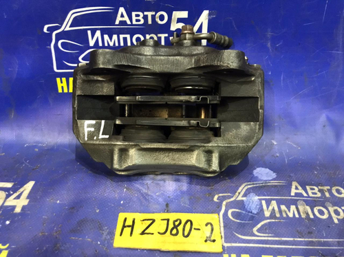 Суппорт тормозной передний левый TOYOTA LAND CRUISER 1990