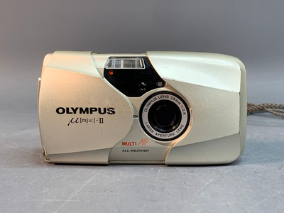 Olympus MJU II плохо закрывается крышка батарейного отсека