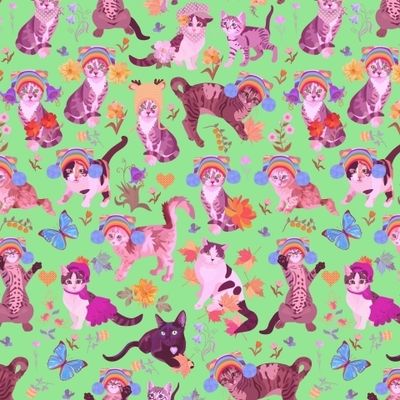 Котики на светло-зеленом фоне