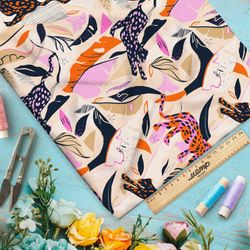 Ткань кулирная гладь яркие леопарды в листьях