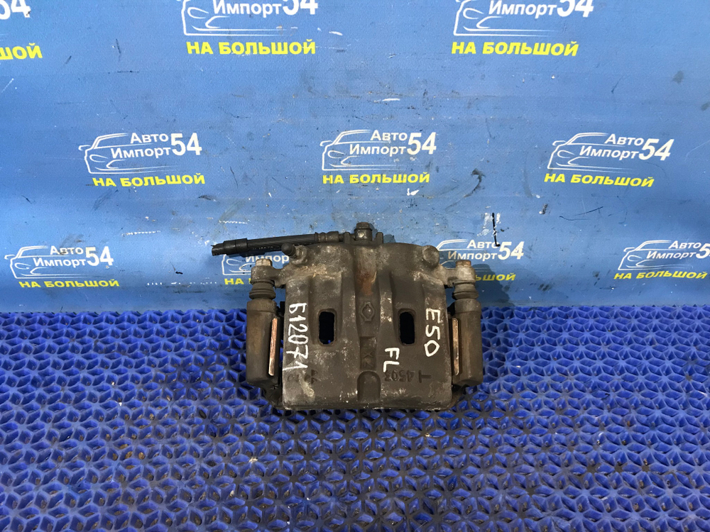 Суппорт тормозной передний левый NISSAN ELGRAND 1997-2002